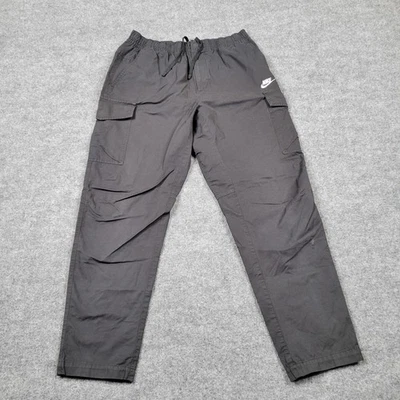 Pantalones cargo Nike para mujer grandes negros cintura elástica jogger utilitario cremallera activo Foto 1 de 4