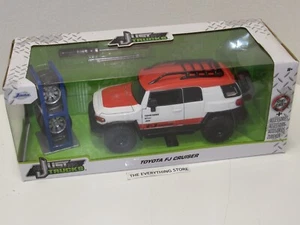 JADA JUST TRUCKS TOYOTA FJ CRUISER WHITE ORANGE NEW IN BOX - Picture 1 of 3