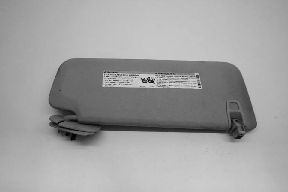 Used Left Sun Visor fits: 2012 Gmc Yukon xl 1500 new style smooth door skin w/il - Image 1 of 1