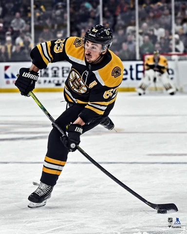 Brad Marchand Boston Bruins Unsigned Black Jersey Shooting 16" x 20" Photo Cover
