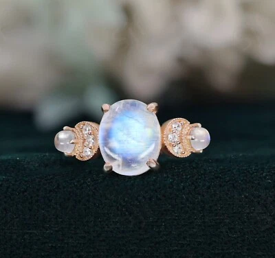 Anillo de compromiso de boda ovalado de plata 925 enchapado en oro rosa de 14 quilates con piedra lunar de fuego azul Foto 1 de 4