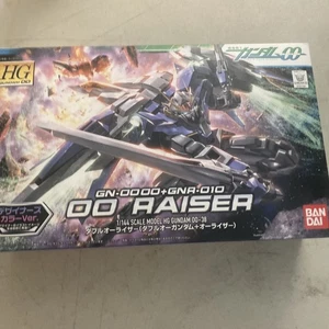BANDAI HG 1/144 GN-0000 + GNR-010 Raiser (Gundam + Raiser) Designer color Ver. - Picture 1 of 5
