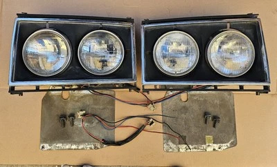 Volvo 264 265 GL 1976 conjunto de lámpara de faro redondo cuádruple/bisel Foto 1 de 4