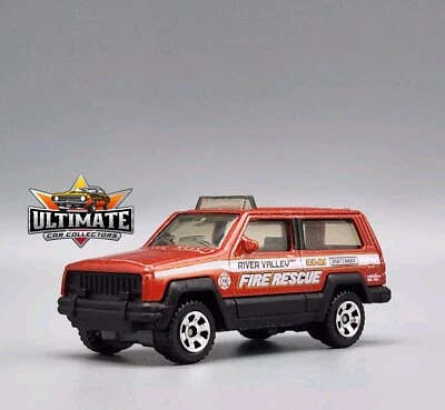 1984-2001 Jeep Cherokee XJ Fire Rescue 1/64 Scale Diecast Model Collector Car  - Image 1 of 4