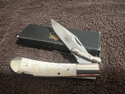 Cuchillo trasero Puma 210563 hueso sintético caja negra Medici bloqueo Foto 1 de 4