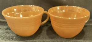 2 VINTAGE COFFEE CUPS~LUSTERWARE~FIRE KING~PEACH LUSTRE~3 BANDS - Picture 1 of 8