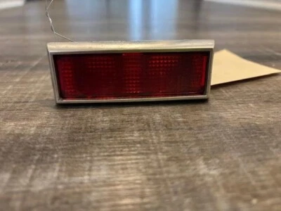 1987 Cadillac Coupe Deville FWD Door Panel Courtesy Light Red Lens PN#20336973 - Image 1 of 4