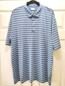 Polo de golf seco Greg Norman. Tamaño: XXL / 2XL. Azul con rayas grises y blancas. - Imagen 1 de 12