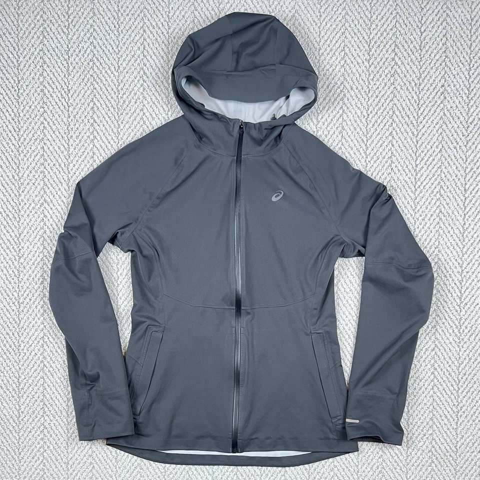 Chaqueta Asics para mujer Running Accelerate talla pequeña S2 impermeable a prueba de viento gris Foto 1 de 4