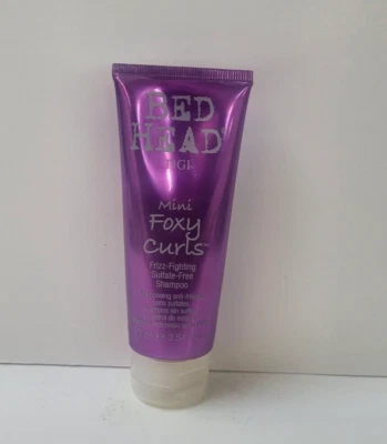 CABEZAL DE CAMA TIGI MINI FOXY CURLS FRIZZ - CHAMPÚ LUCHA LIBRE DE SULFATOS ~ 2,54 oz. Foto 1 de 2