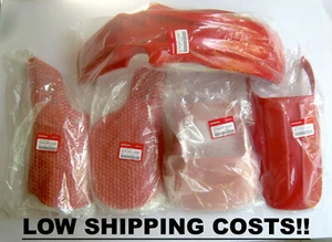 GENUINE HONDA MTX125 MTX125R MTX125R2 FENDER SIDE COVER VISOR SET RED R134 - Picture 1 of 6