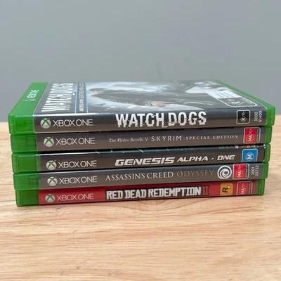 Xbox One 5x Game Lot Watchdogs RDR2 Genesis Alpha Skyrim Assassins Creed - Image 1 of 4