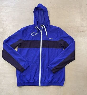 Chaqueta cortavientos Reebok para mujer talla S púrpura cremallera completa con capucha Foto 1 de 4