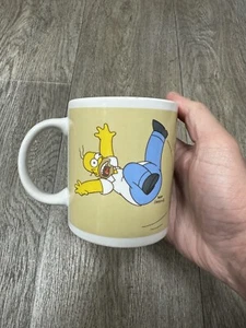 Die Simpsons Vaterschaft: Der ultimative Nervenkitzel Ride Becher 2011  - Bild 1 von 8