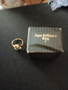 Avon Womens Aqua Brilliance Ring Size 6 Gold Color Simulated Gems - Picture 1 of 4