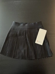 Lululemon Damen Varsity HR Plissee Tennisrock Größe 0 – schwarz  - Bild 1 von 5