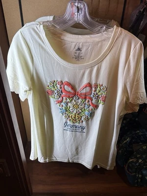Camisa Minnie 2025 Disney Epcot World Showcase Alemanha Floresta Negra Floral G 1X - Imagem 1 de 4