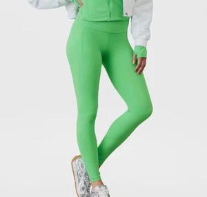 Athleta Salutation Stash hoch geschnittene Leggings Seitentaschen Talgrün 21" M 109 $ - Bild 1 von 7