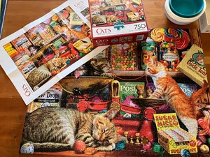 puzzle Büffel. Katzen Süßwarenladen Kätzchen. 750 Teile. Kommt mit Poster 1 Stück - Bild 1 von 3
