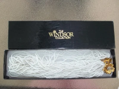 The Windsor Collection Necklace Small white beads, gold floral grasp, strands - Image 1 of 4