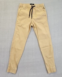 Jogger Hollister Advanced elástico ajustado para hombre XS beige bolsillos con cordón usado en excelente estado - Imagen 1 de 10
