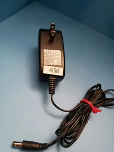 Adaptador de CA NETGEAR T012 LF1209 12V 1A - Imagen 1 de 5