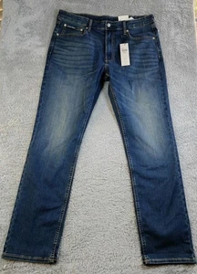 Pantalones de mezclilla rectos ajustados para hombre Calvin Klein azules 36x32 - Imagen 1 de 3