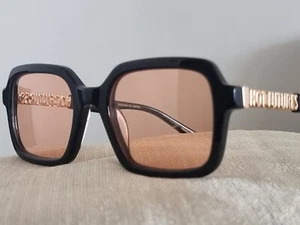 HOT FUTURES SONNENBRILLE DREAMLAND SCHWARZ UND GOLD EIN URLAUB & IDEE MODEKLASSIKER - Bild 1 von 12