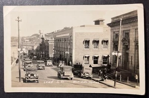 Lead South Dakota RPPC DOPS street view Black Hills Studio new hoist in backgrnd - Picture 1 of 2