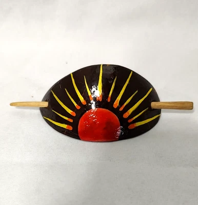 Corbata de pelo ovalada de cuero con palo de madera pintado a mano diseño amanecer Foto 1 de 4