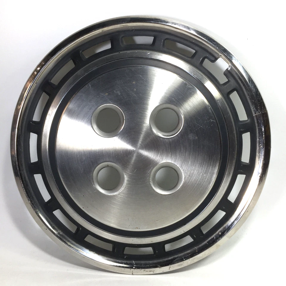 Tapacubos central cubierta de rueda vintage 13” para Isuzu Gemini PF60 PF50 OEM usado Foto 1 de 4