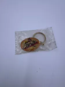 Llavero de metal vintage de cerveza de paja con forma ovalada nuevo en bolsa - Imagen 1 de 6