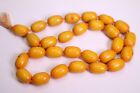 Catalin Kette mit 28 schönen gelben Perlen Maße ca. je 28x19mm 221 g getestet