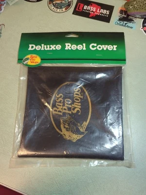 Cubierta de carrete Bass Pro Shops Deluxe dorada y negra. Listo para usar Foto 1 de 3