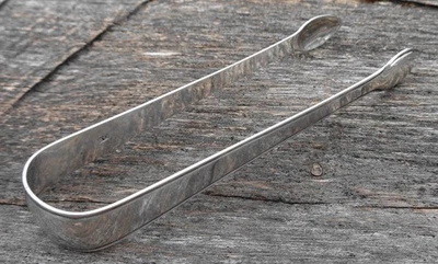 Pinzas antiguas británicas de plata esterlina con sello marca del fabricante "GB" 36 gramos Foto 1 de 4