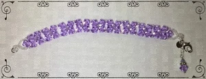 Bracciale artigianale realizzato con Swarovski viola ametista viola argento sterling - Foto 1 di 5