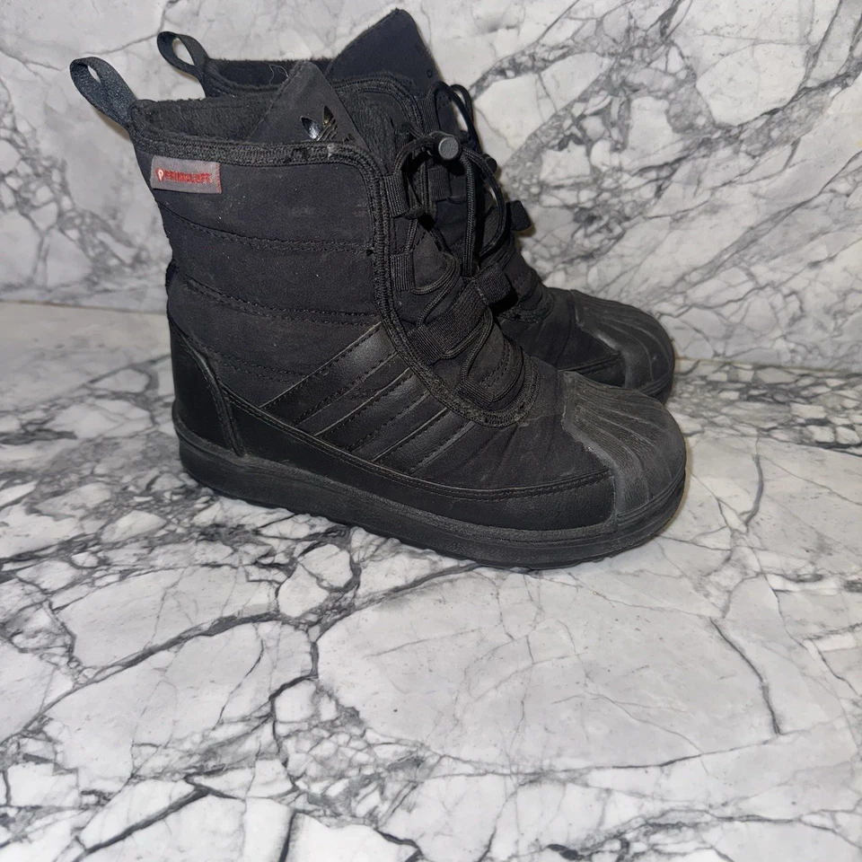 Botas de nieve Adidas Primaloft negras para niños 12K  Foto 1 de 4