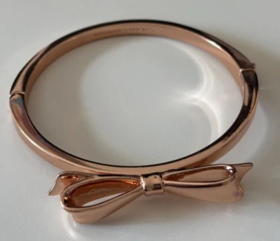 Brazalete Brazalete Kate Spade Tono Oro Rosa Mini Lazo Foto 1 de 4