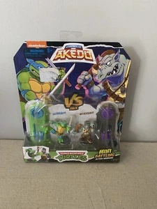 Akedo Teenage Mutant Ninja Turtles Leonardo vs Rocksteady Mini Figure Set- New - Picture 1 of 5