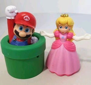 McDonald's 2022 Toy Spinning Super Mario Bros & Jumping Mario & Princess Peach - Picture 1 of 8