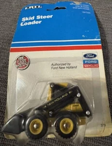 ERTL FORD NEW HOLLAND SKID STEER LOADER 1:64 scale diecast metal NIB 1991 - Picture 1 of 3