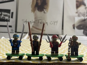 TEENAGE MUTANT NINJA TURTLES 4x SET LEGO MINIFIG MINI FIGURE movie skateboards - Picture 1 of 9