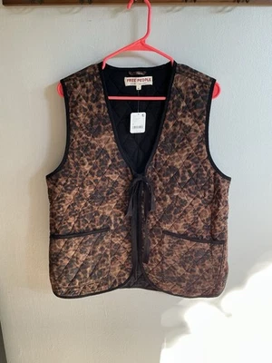 Nuevo con etiquetas Chaleco Acolchado Estampado Leopardo Free People Talla Mediana Estampado Animal Nuevo Foto 1 de 3