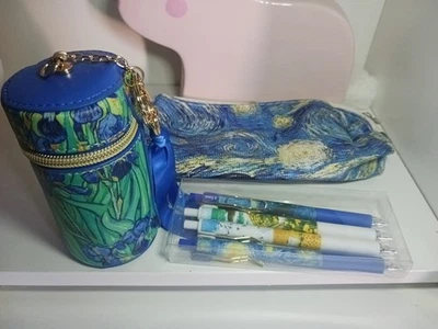 Juego de bolsa impresionista con bolígrafos Foto 1 de 4