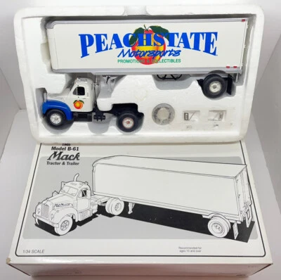 1St GEAR 1960 B-61 MACK PEACHSTATE MOTORSPORTS  #19-1272 TRACTOR AND TRAILER 1 - Image 1 of 4