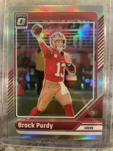 2024 Donruss Optic Football #170 Silver Holo Brock Purdy San Francisco 49ers - Bild 1 von 2
