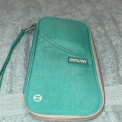 Cartera de viaje DEFEAY RFID con correa para muñeca Foto 1 de 4