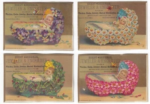4 Victorian Trade Cards Greenman Richfield Springs NY Babies in Flower Cradles - Picture 1 of 2