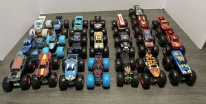 Lot 23 monster jam trucks 1:64 12 Spin Master, 11 Hot Wheels Iron Man, Octon8er - Picture 1 of 18