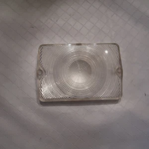 NOS 1960 Cadillac parking light lens OEM Guide No Sunchecking No cracks or chips - Picture 1 of 2